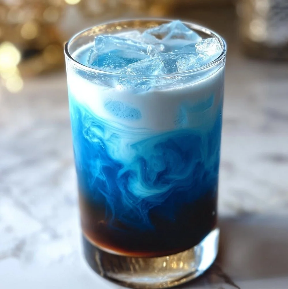 Russian Blue Moon cocktail served in a stylish glass with garnishes